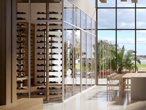 a room with a table and a wine rack